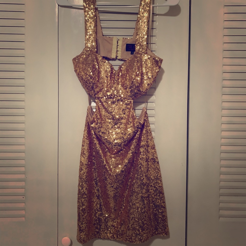 Gorgeous cutout and open back sequin dress